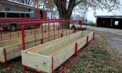 16 foot hay and grain feeder. Has steel frame and runners and 2x boards for grain portion of feeder. This feeder can be easily moved anywhere you like. Feeders are 16 foot long and they are 30 inches wide and approximately 4 foot tall. 16 footer weighs
