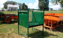 These are 4 foot by 4 foot by 6 foot steel pasture hay * grain feeders. Easy to move from pasture to pasture. These come in standard hunter green but are also available in red, silver, brown, white, or black.