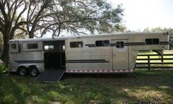 199 very low mileage 4 horse 4 star horse trailer with dressing room. Can be set up for three box stalls