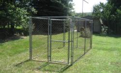 Sturdy outdoor kennel with chain link fencing. 6' high sides.
Door on the end 3' wide.