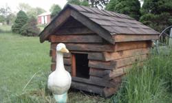 Log dog house. $100 -- for more info.